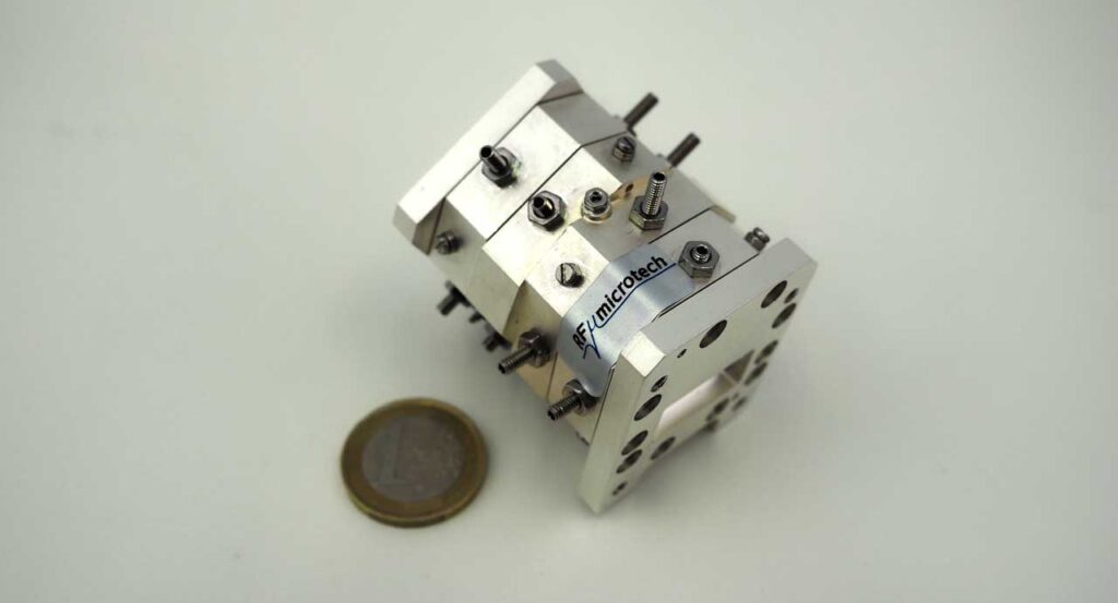 Low loss Ku-band bandpass filter with wide spurious free response