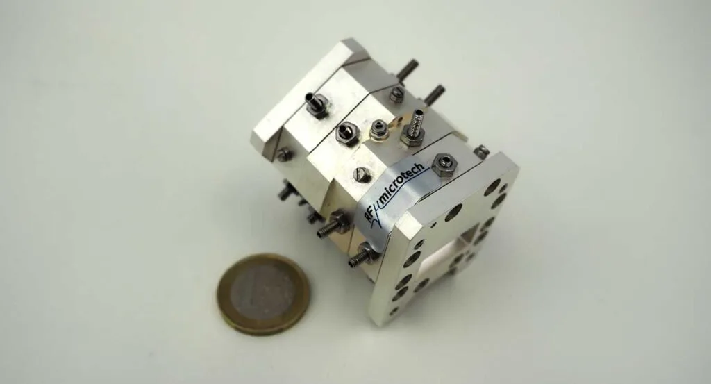 Low loss Ku-band bandpass filter with wide spurious free response